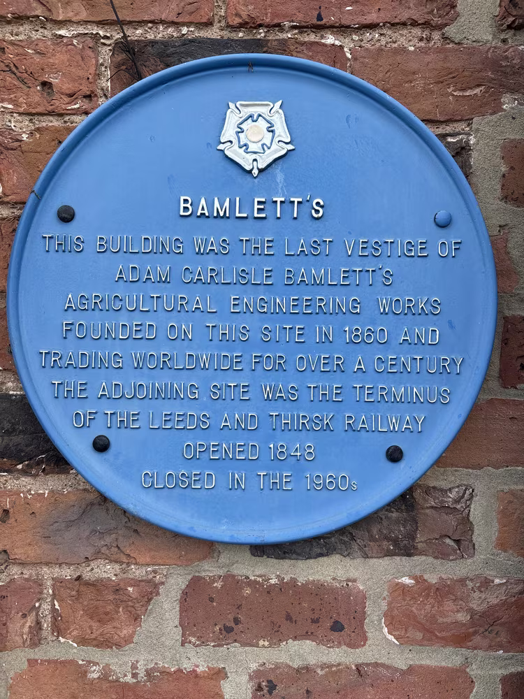 A plaque on the original Thirsk and Sowerby route